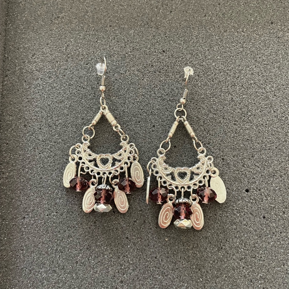 Silver/brown earrings. Used/good conditions.